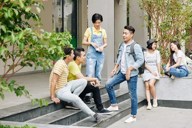people, friends, students, group of people, friendship, smiling, togetherness, cheerful, young adults, happiness, talking, casual clothing, university, lifestyle, university students, communication, urban scene. Best community management software for UK universities: six options compared