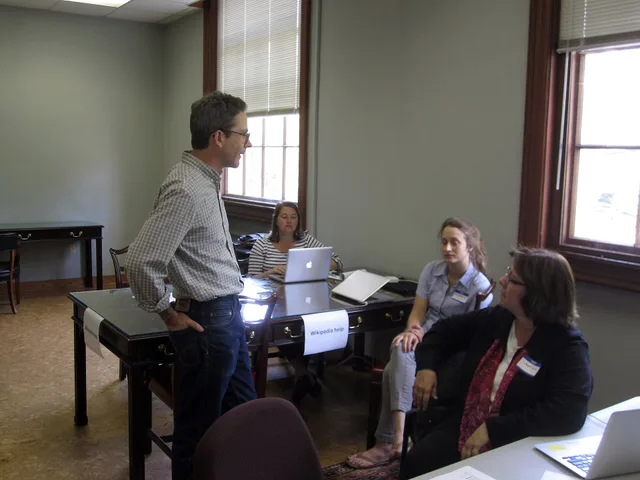 Wikipedia help desk at the UNC edit-a-thon, April 2013. A method for community management benchmark research