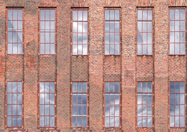 facade, architecture, housewall, building, window, brick, skyscraper, urban, house facade, company building, high, red-brown, glass, hall, reflection, lattice windows, stained glass window. Community management review methodology in England: five provider checks, from Companies House to Cyber Essentials